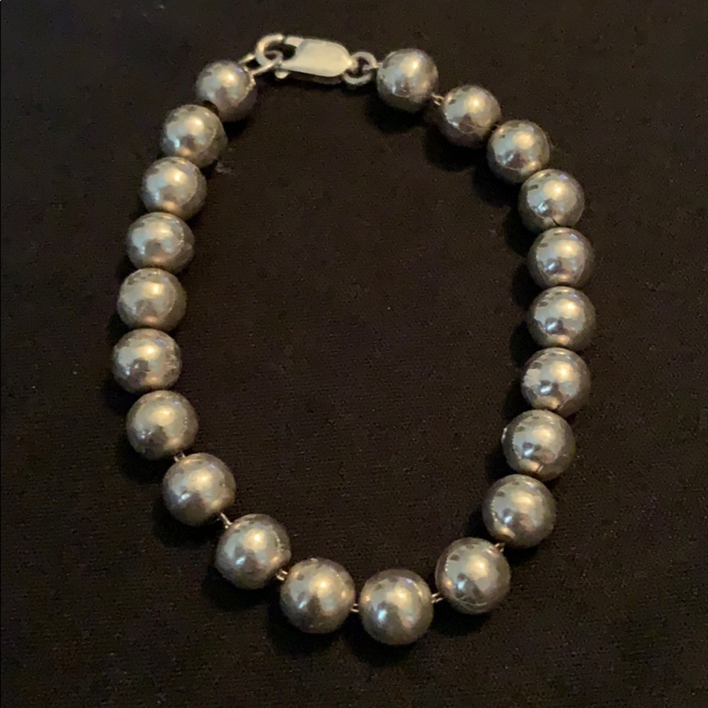 Silver tone beaded bracelet
